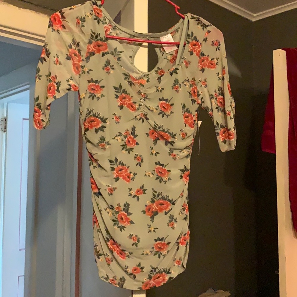 Beautiful floral see through blouse with matching attached cami ..never worn!!